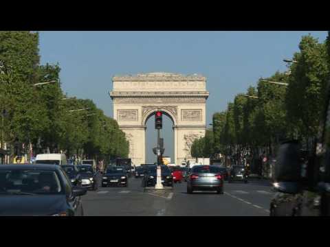 People on the Champs-Elysées react to shooting of police officer