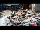 Garbage piles up in Sri Lanka capital as toll hits 30