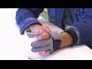 Robotic glove gives hand artificial gripping strength