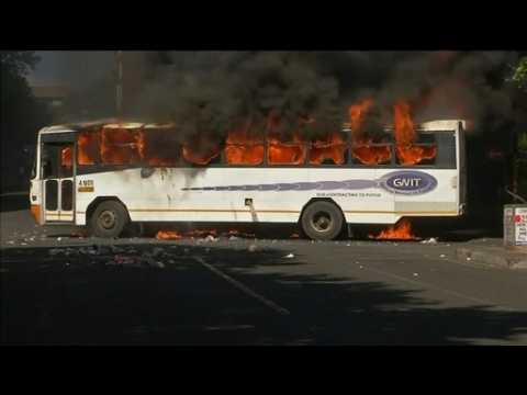 Bus burns, students protest S. Africa tuition fees