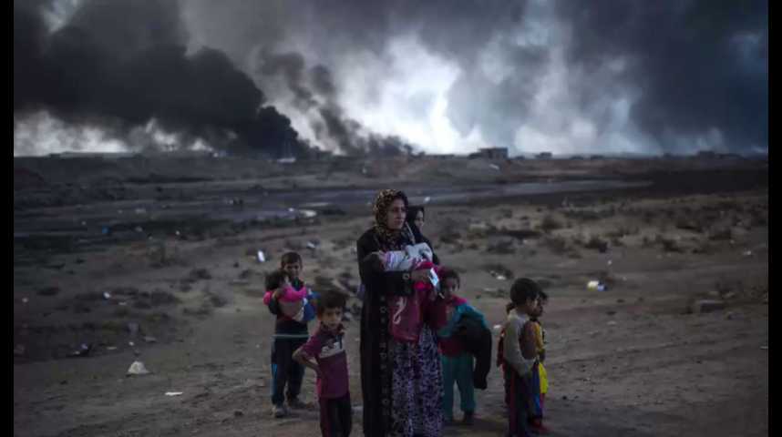 Illustration pour la vidéo La bataille de Mossoul fait craindre un désastre humanitaire