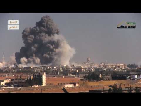 Rebel groups detonate huge car bombs in western Aleppo