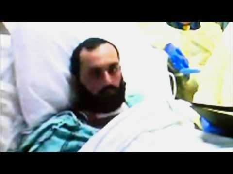 Accused New York bomber pleads not guilty from hospital bed
