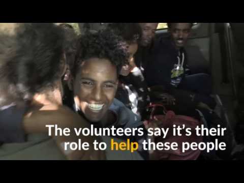 French volunteers help migrants cross Italian border