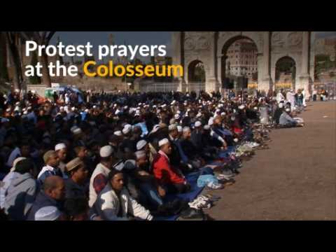 Muslims pray at the Colosseum in protest against mosque closures