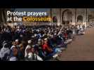 Muslims pray at the Colosseum in protest against mosque closures