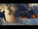 Migrants set fire to EU asylum offices on Lesbos