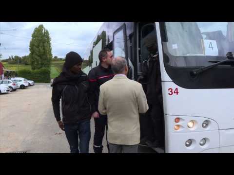 Calais migrants arrive at accomodation centres