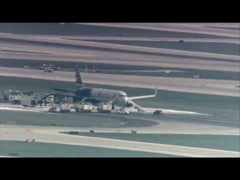 Smoke fills the air after jet blows tire on takeoff at Chicago airport