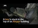 Boy rescued from rubble in Aleppo
