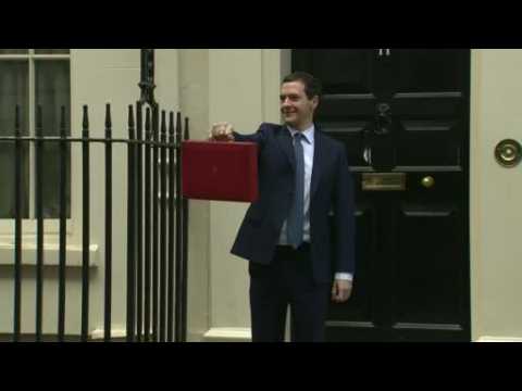 UK's Osborne cuts spending, taxes sugar