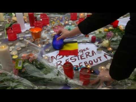 Tears, cheers, free hugs at tribute to Brussels victims