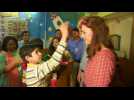 William and Kate visit New Delhi street kids' charity