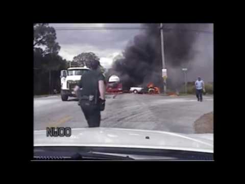 Dashcam video shows dramatic car fire rescue