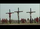 Filipino Catholics re-enact Jesus' crucifixion