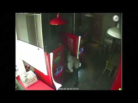 Police release video of man breaking into burger place to make food