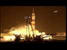 U.S., Russian crew blast off toward space station