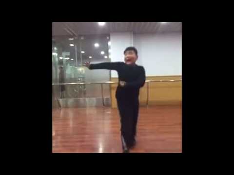 Little Chinese boy dances like a future king of Salsa