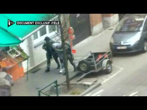 Local resident captures Brussels police raid on video