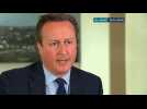 Cameron admits having held stake in father's offshore trust
