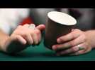 How to perform the coin in the cup magic trick
