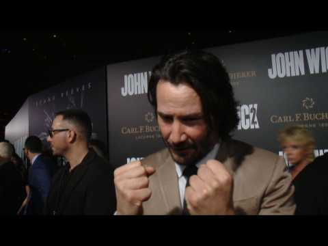 Keanu Reeves "Feels The Suit" At 'John Wick: Chapter 2' Premiere