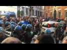 Italy: protesting taxi drivers, street vendors clash with police