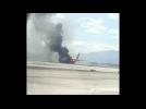 Photographs show British Airways plane on fire at a Las Vegas airport