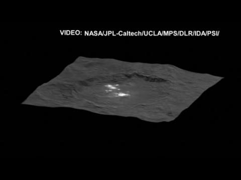 NASA releases new images of mysterious bright spots on dwarf planet