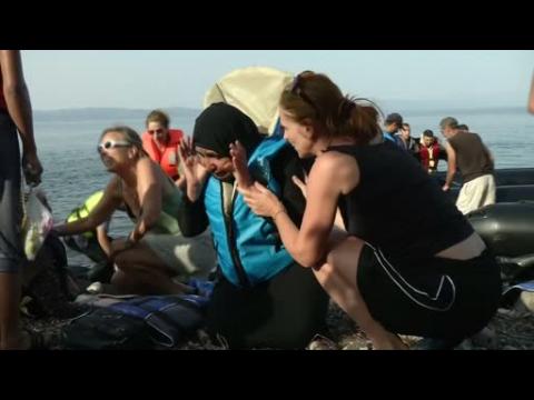 Video shows migrant dinghy arriving at Greek shore