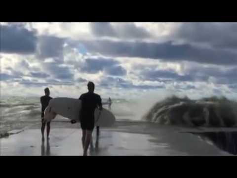 Surfers battle the waves and stormy weather in Canada