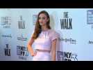 A Stunning Charlotte Le Bon Chats At 'The Walk' Premiere