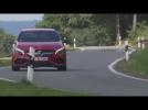 The new Mercedes-AMG A 45 4MATIC Jupiter Red Driving Video | AutoMotoTV
