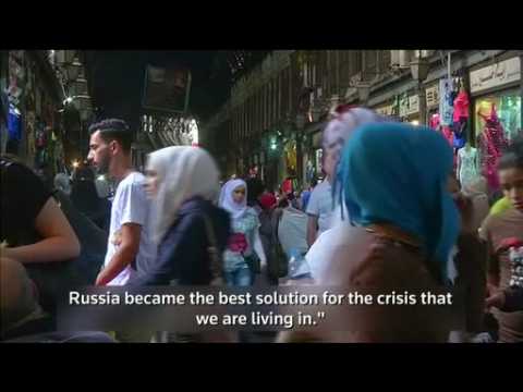Damascus residents applaud Russian air strikes