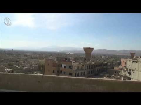 Barrel bombs strike Darayya and Daraa, rebels target Syrian forces in Homs - eyewitness video