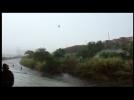 Video shows dramatic rescue of civilians from LA River