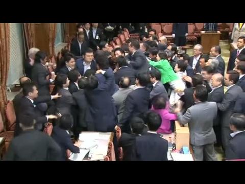 Japan upper house panel approves defence bills