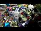 Cop cars become memorials outside Dallas police station