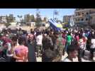Thousands return to Syria's Manbij after IS militants flee