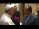 France's Hollande meets Pope, visits church to honor attack victims