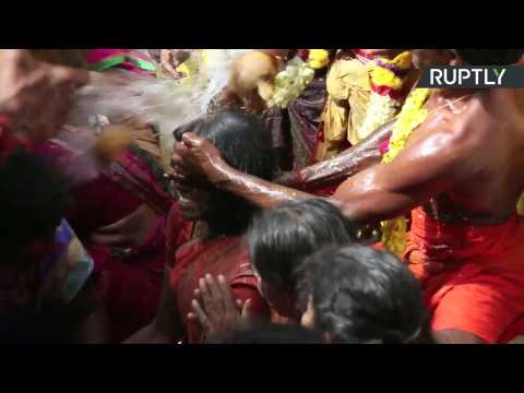 Coconuts Smashed On Heads of Devotees for Indian Ritual