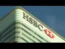 HSBC first-half profits slide nearly 30%