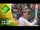 The Olympic torch lands in Rio amid protests