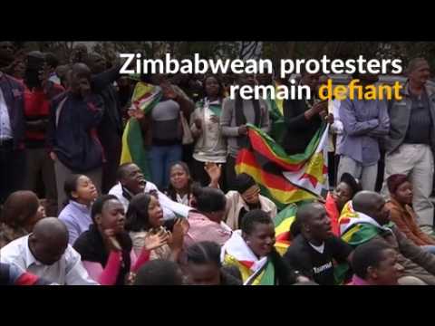 Anti-Mugabe demonstrators defiant after court charges protest leader