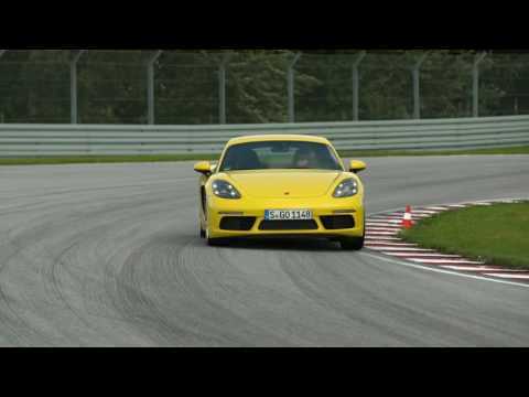 Porsche 718 Cayman S Racing Yellow Trackside Driving Video Trailer | AutoMotoTV