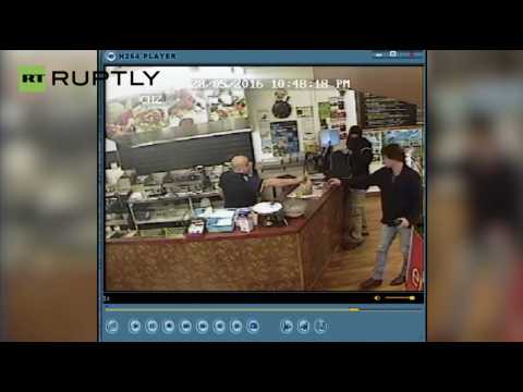 Restaurant Owner Totally Ignores Armed Robber, Continues Serving Customer