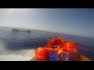 Video shows Norwegian coastguard rescuing boatload of migrants off Libyan coast
