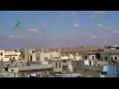 War planes strike Homs as Geneva hosts UN-brokered peace talks - amateur video