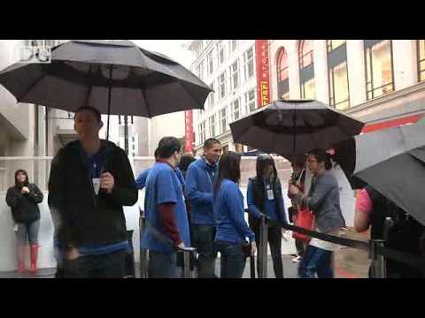 Video: New iPad goes on sale in San Francisco, hundreds line up in the rain to buy one