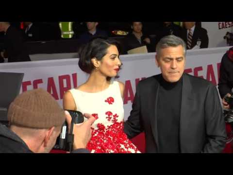 George, Amal Clooney shine on red carpet